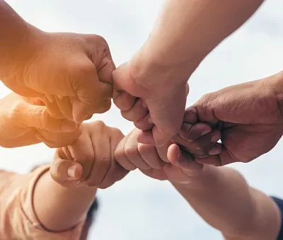 close up hands teamwork group of multi racial people meeting join hands diversity people