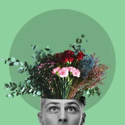 mental health flowers and head with a man in studio on a green background for freedom of