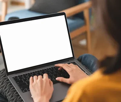 woman hand type a message on the keyboard on laptop with blank copy space screen mock up for